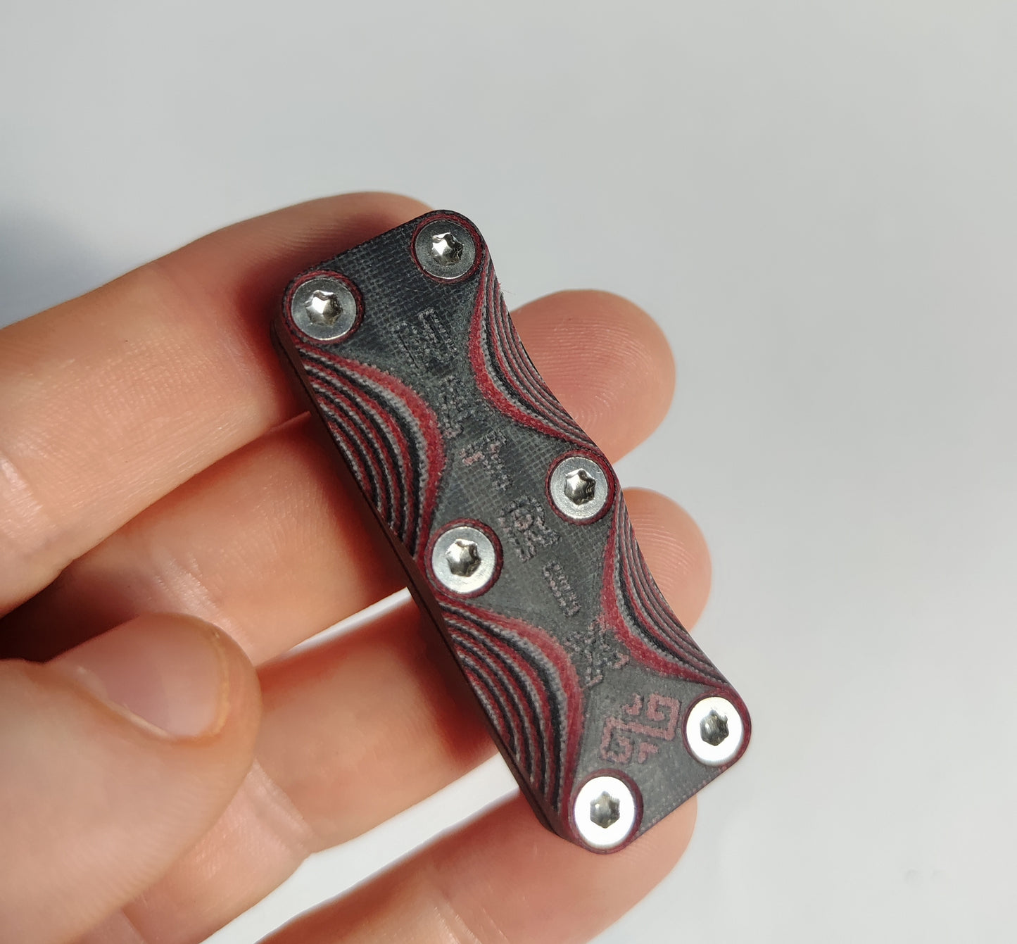 EDC Haptic slider from Micarta (Black and Red)